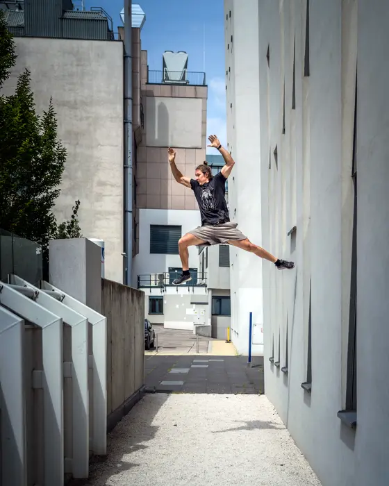 Wall run in a narrow alley
