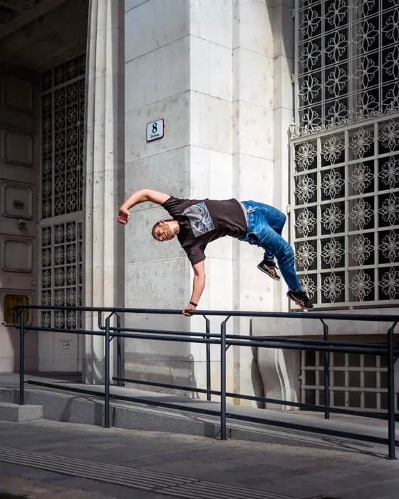 Parkour move over a railing